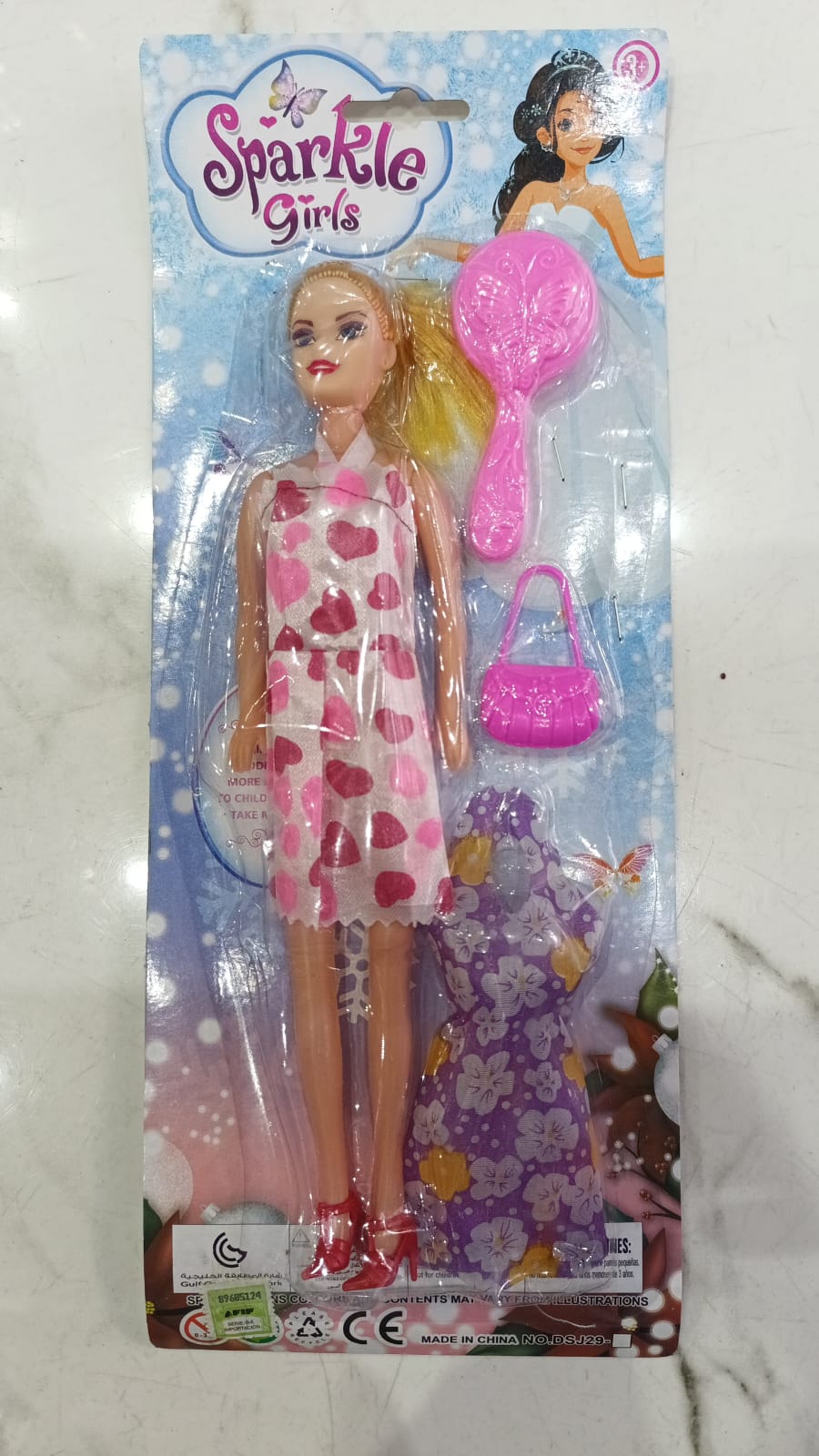 Muñeca c/vestido y peine sparkle